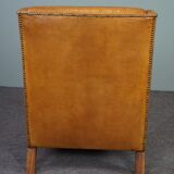 Modern charming armchair in sheepskin