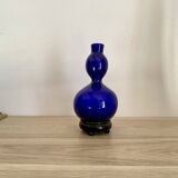 Blue opaline vase, wooden base