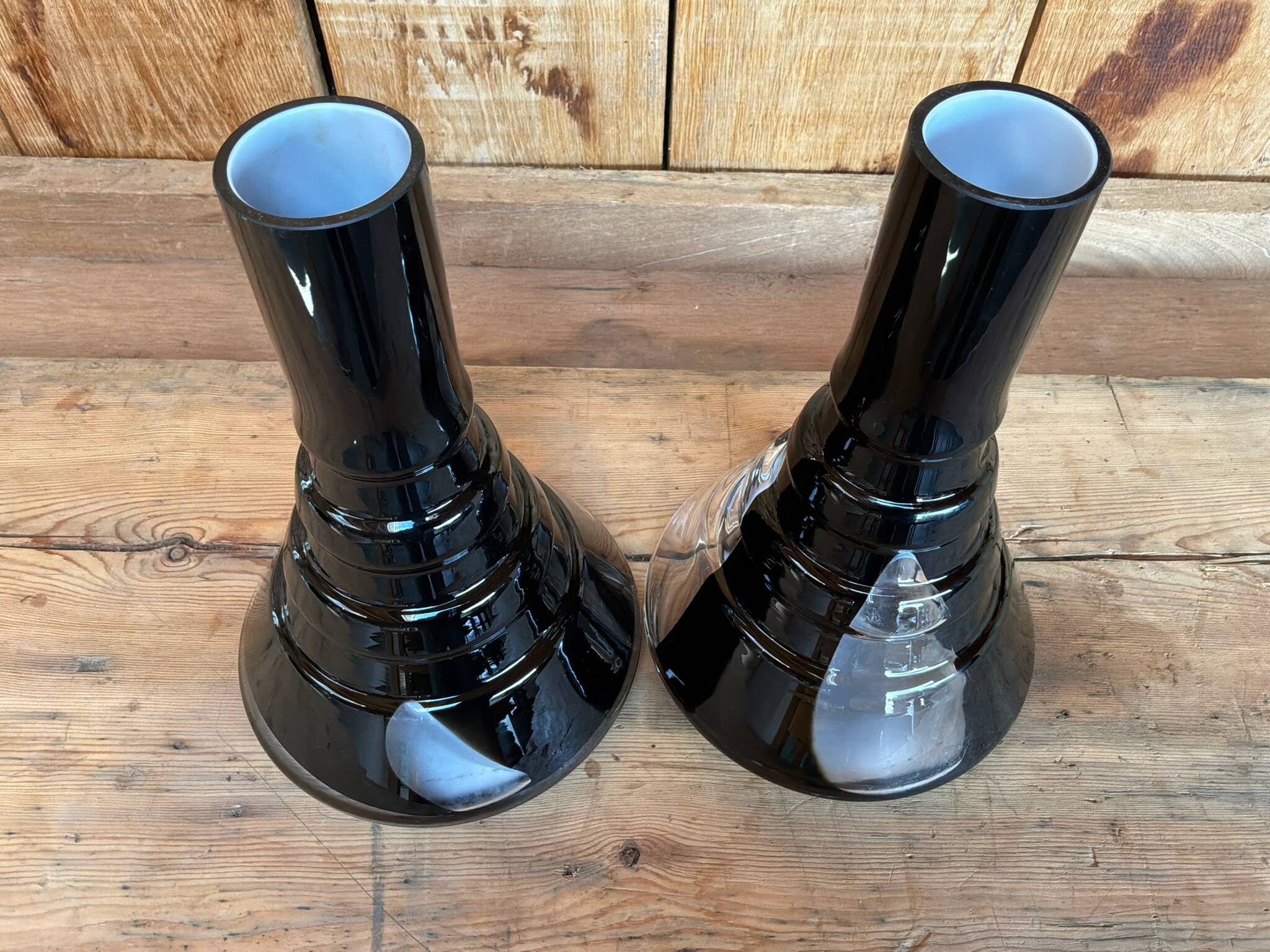 Pair of black and opaline multilayer glass vases. 1970s.