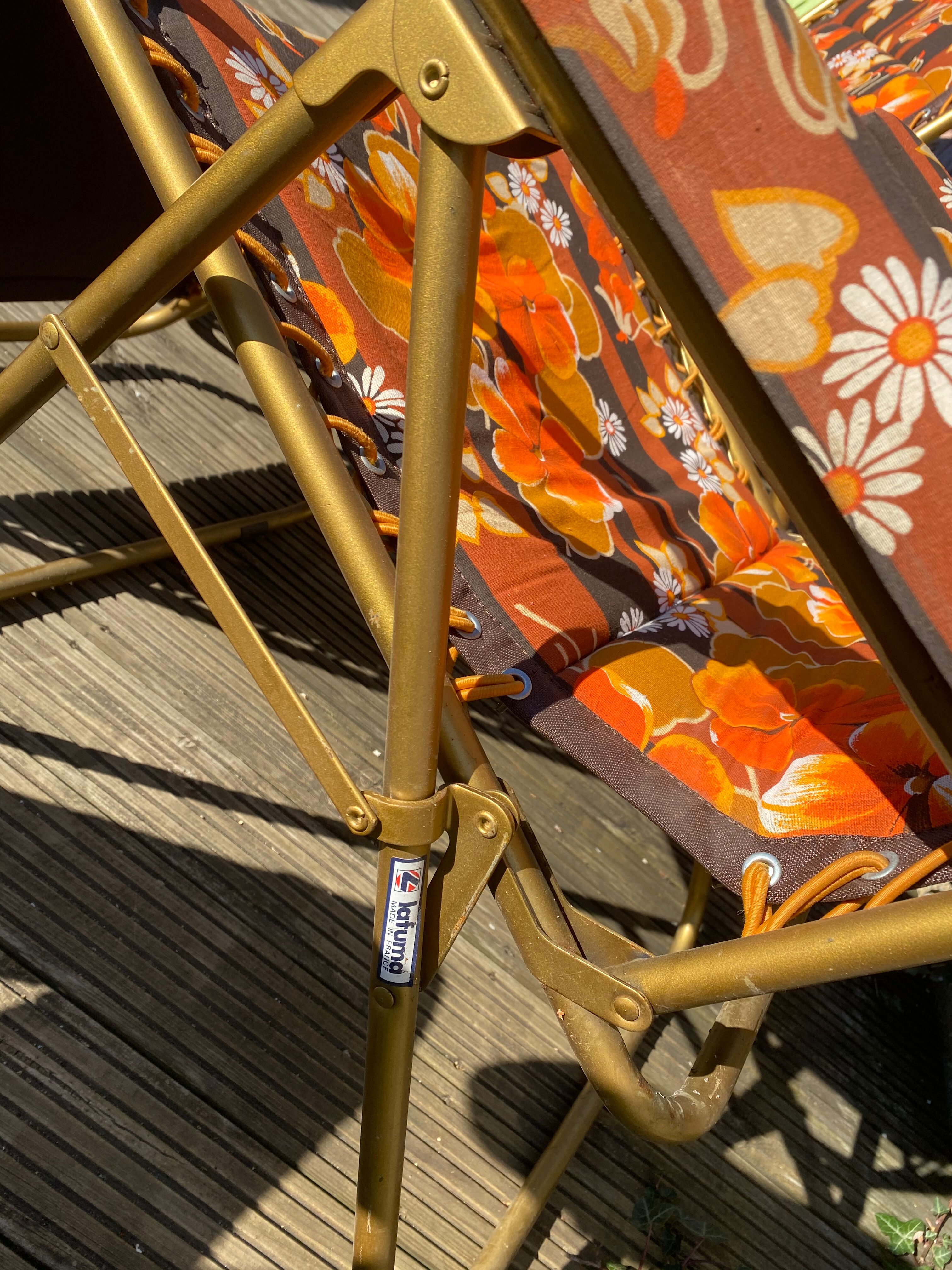 Vintage deckchairs the pair lafuma with flowers