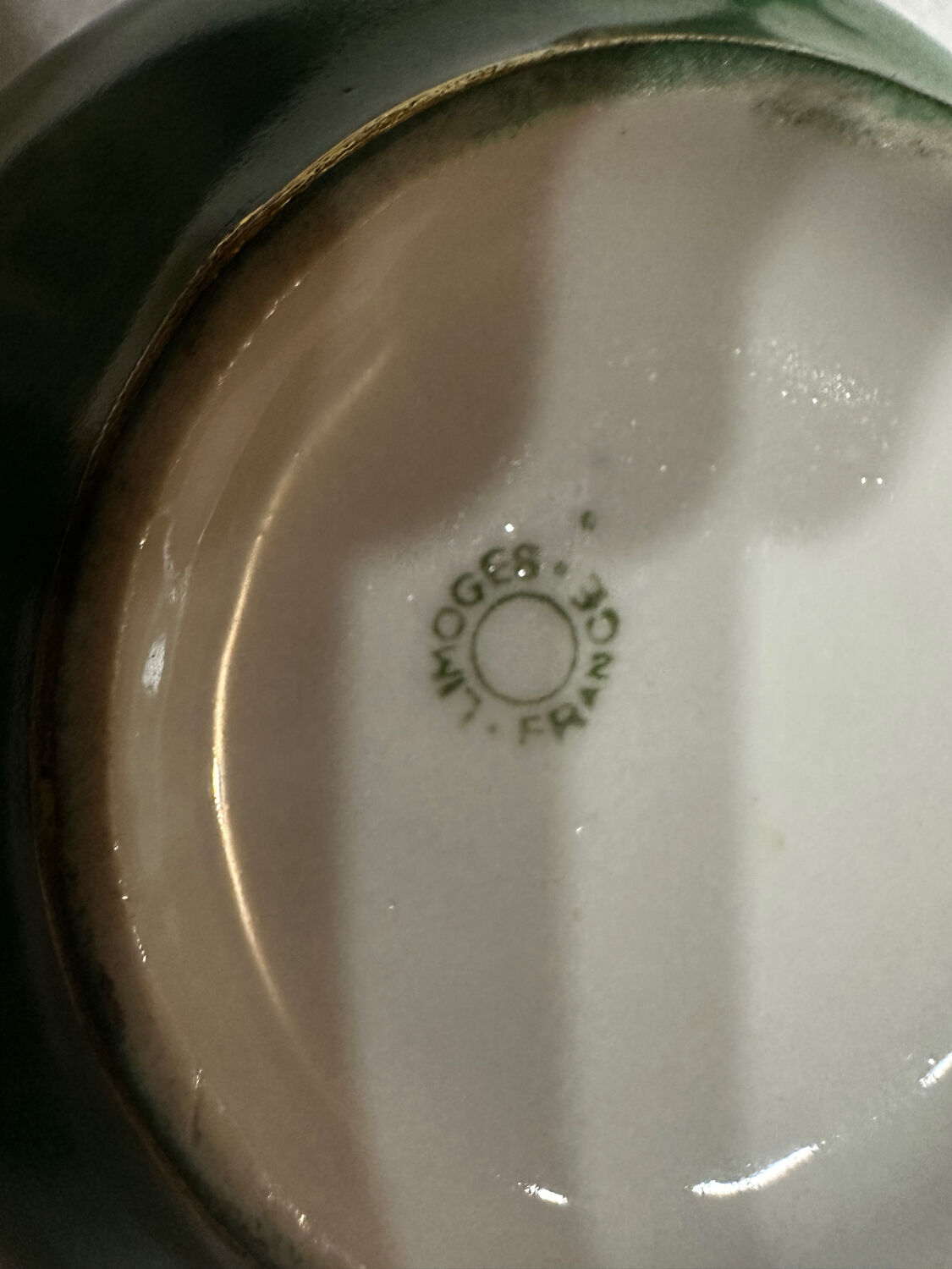 Service 14 cup and saucer in Art Deco Emerald Green and Gold.