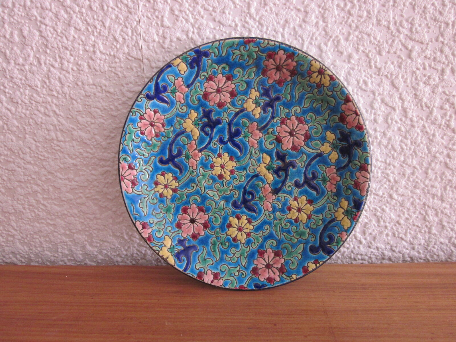 Saucer in enamels of Longwy