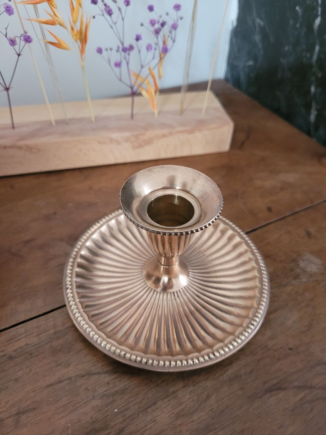 Brass candlestick with a ribbed dish