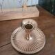 Brass candlestick with a ribbed dish