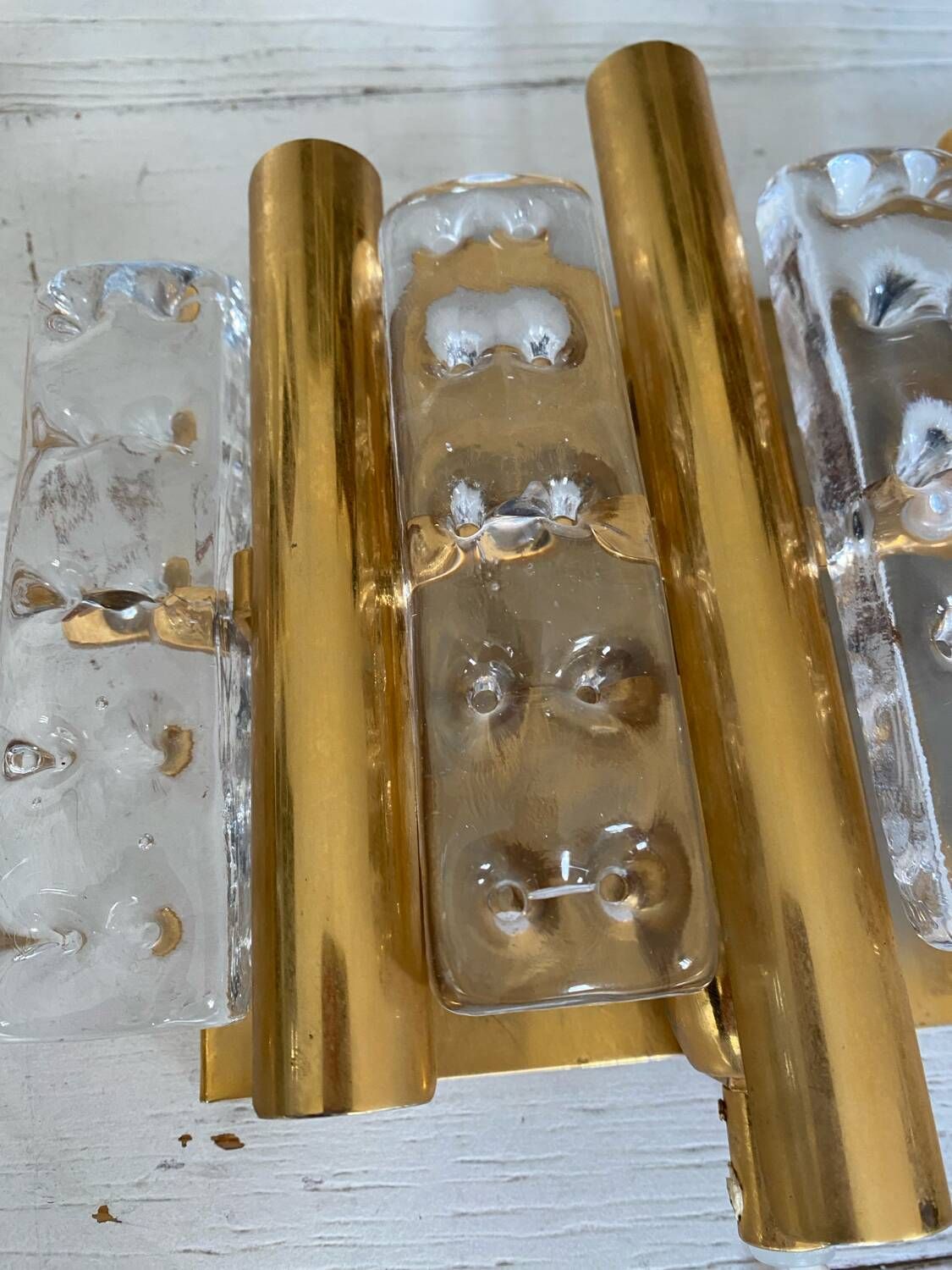 HANS AGNE JAKOBSSON. A pair of glass and brass wall lights