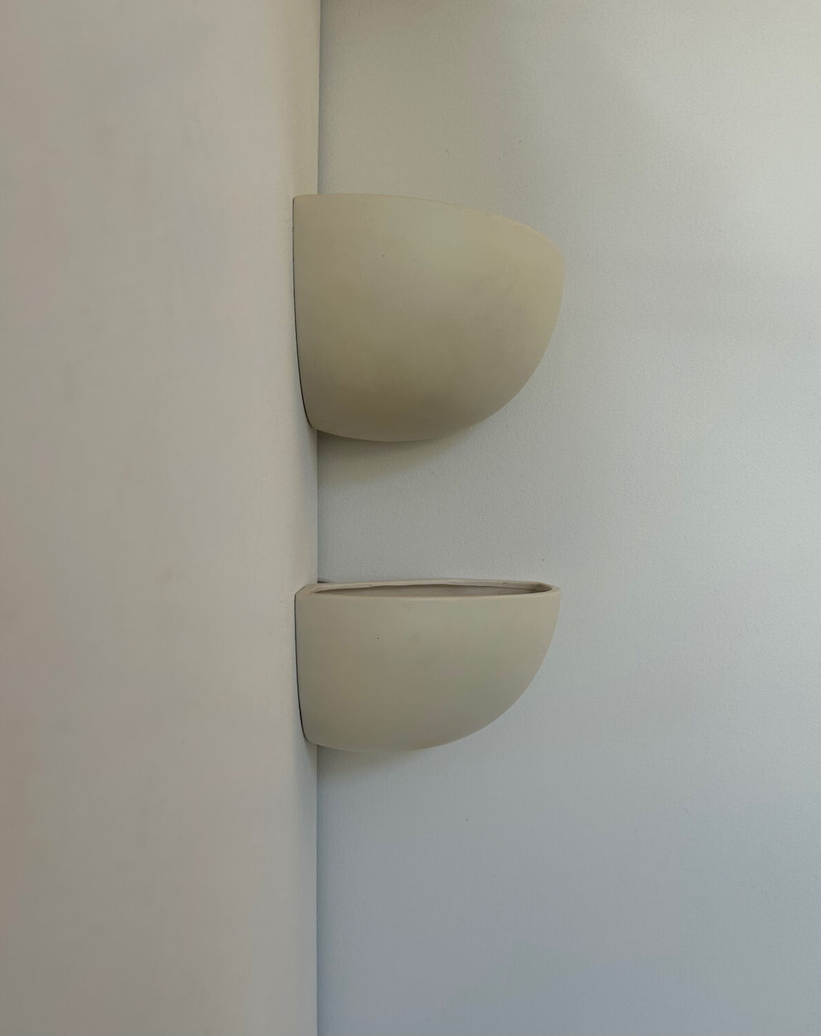 Pair of vintage corner sconces, matte white porcelain, France 1970
