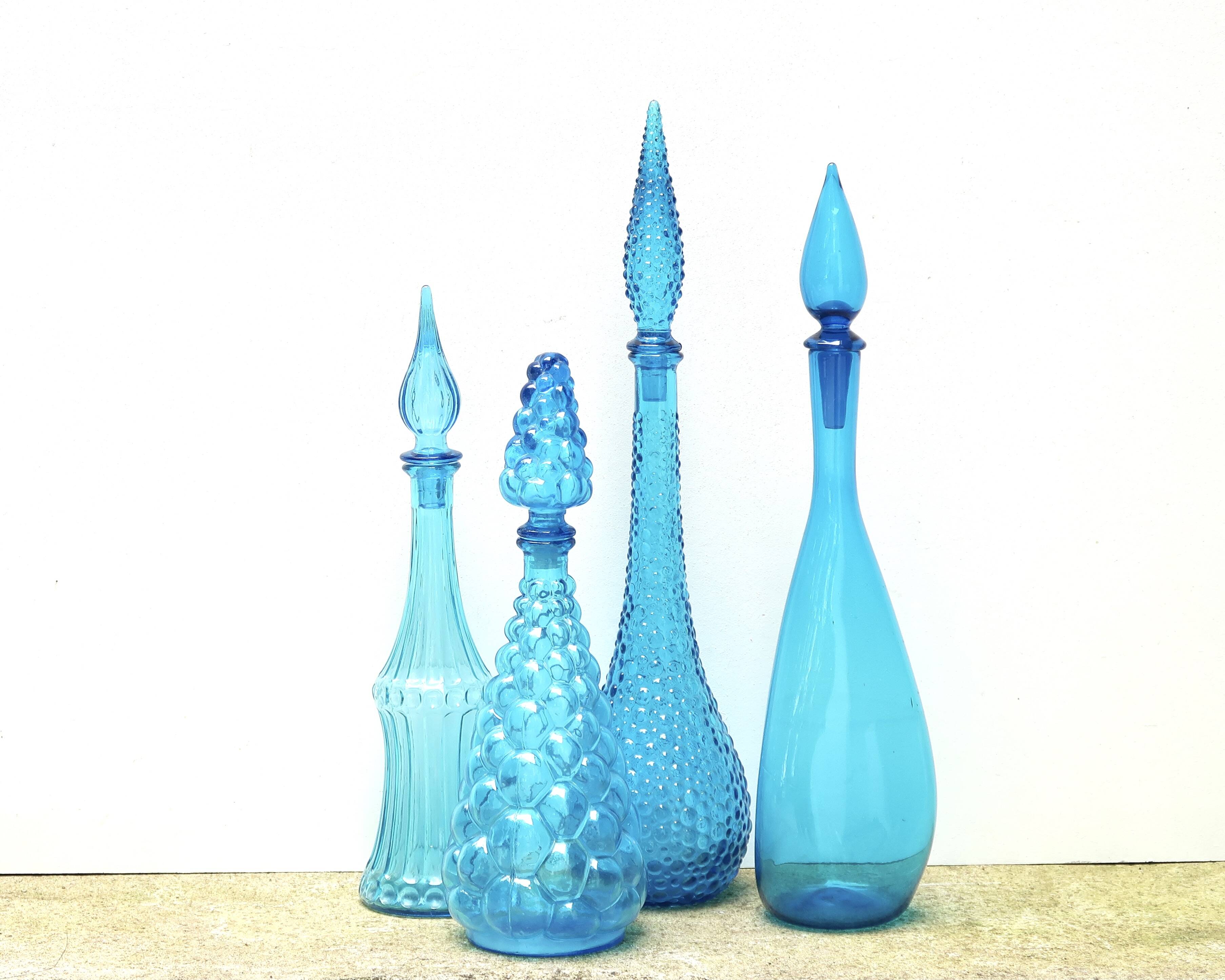 Set of four Italian blue glass carafes, 1960s