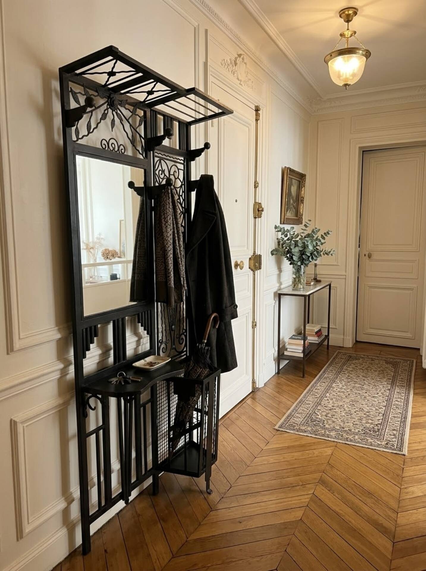 Art Deco coat rack wardrobe in wrought iron from the 1930s.