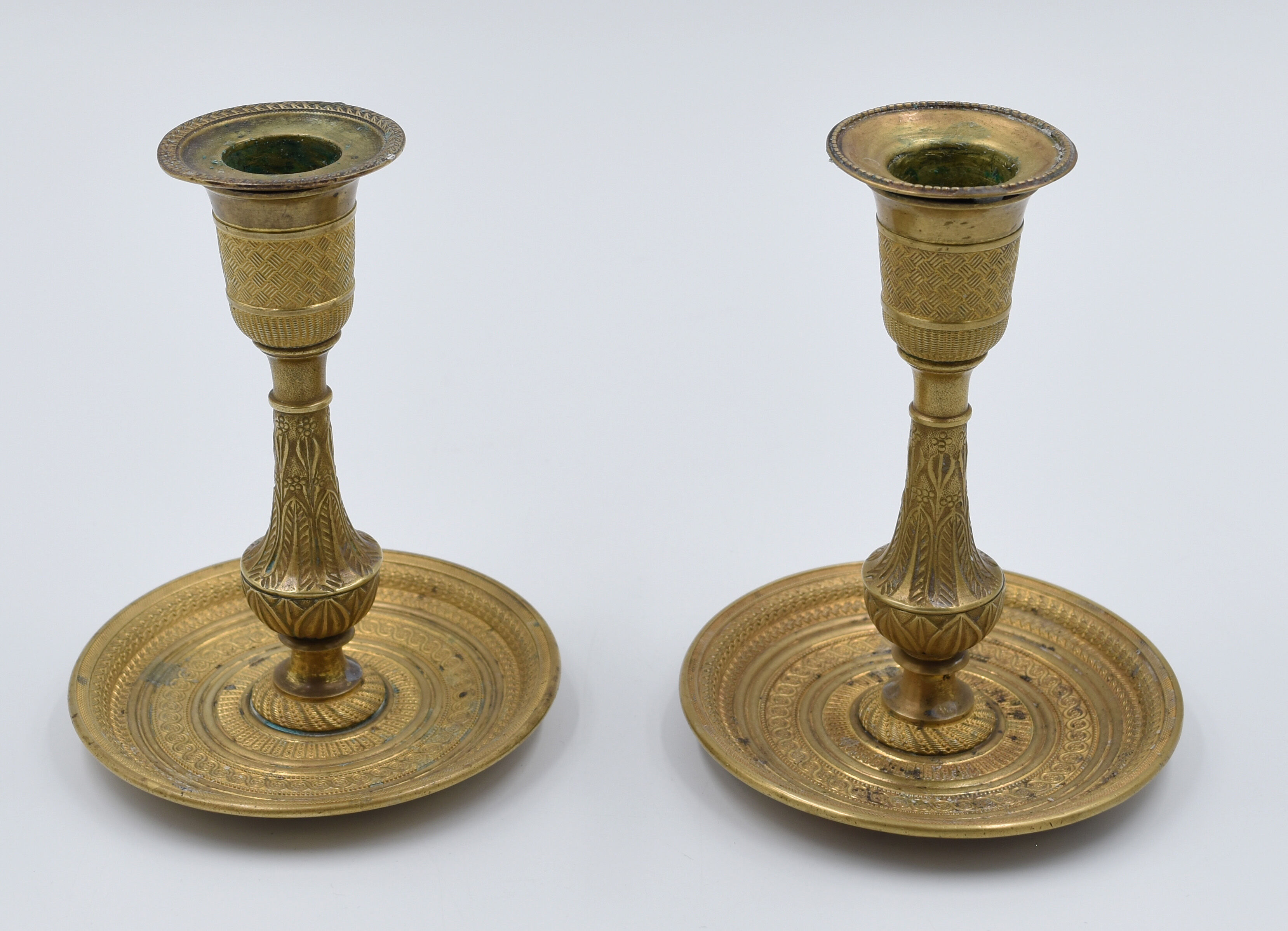 Pair of gossip candle holders in bronze and brass gilded period