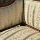 Low armchair in finely carved wood in the Louis XVI style from the 19th century