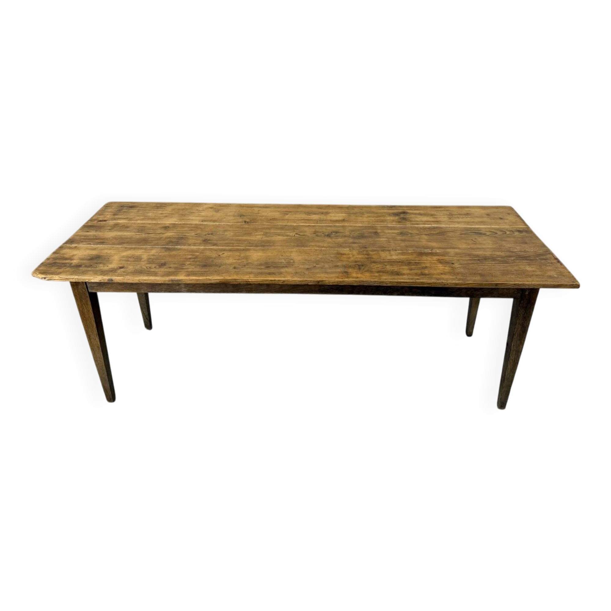 Old farmhouse table with tapered legs, late 19th to early 20th century.