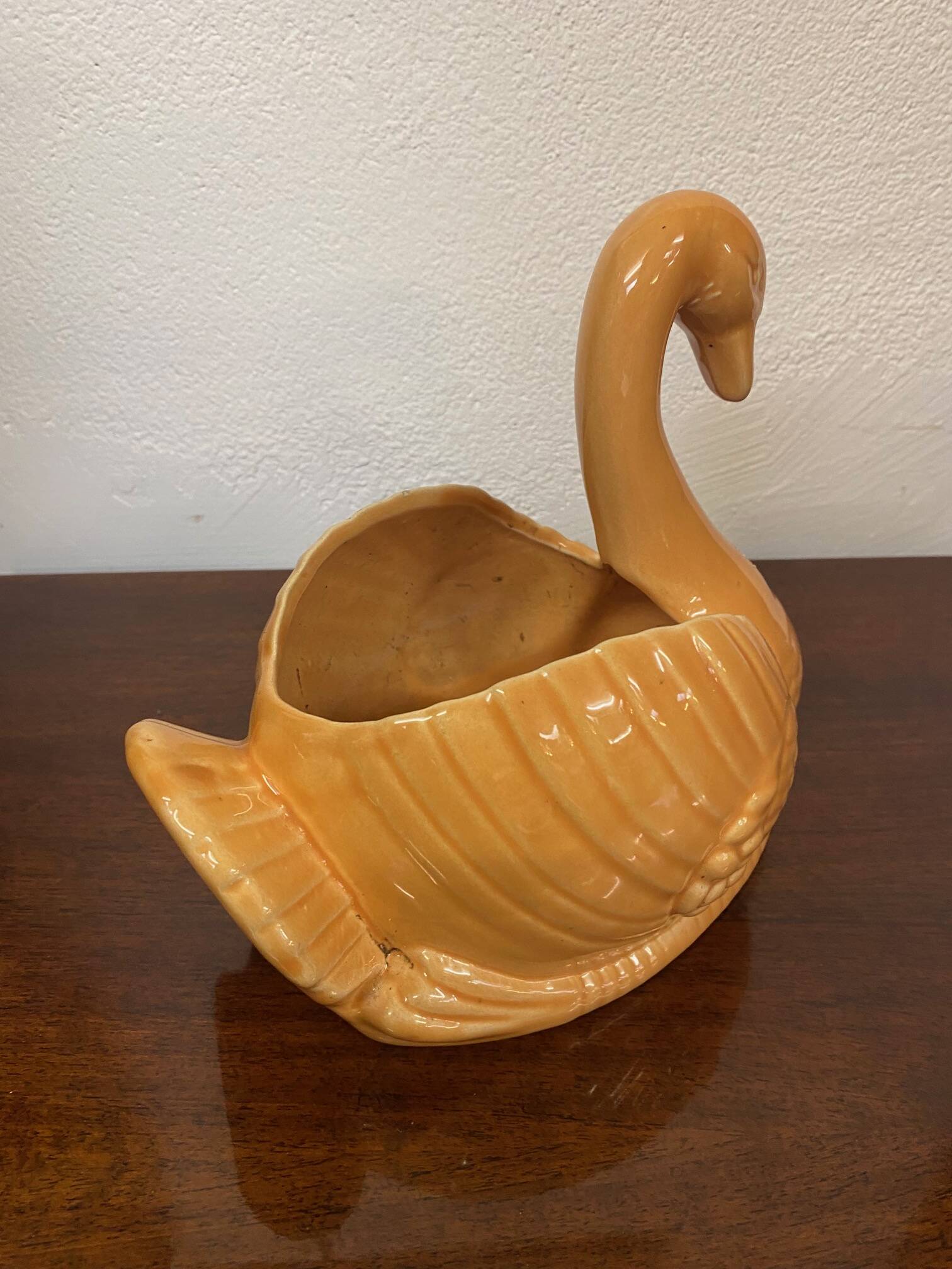 Swan shaped planter in 70s earthenware apricot orange color