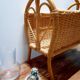 Antique rattan magazine rack