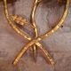Pair of gold metal foliage appliques