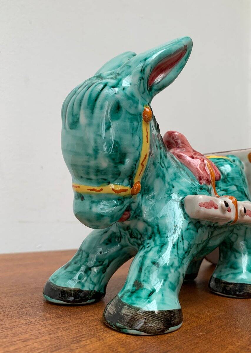 Vintage Italian hand-painted sculpture of a donkey with a cart in the shape of a bowl from Deruta, Italy.
