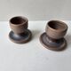 Set of 2 ceramic egg cups Signed Ludovic