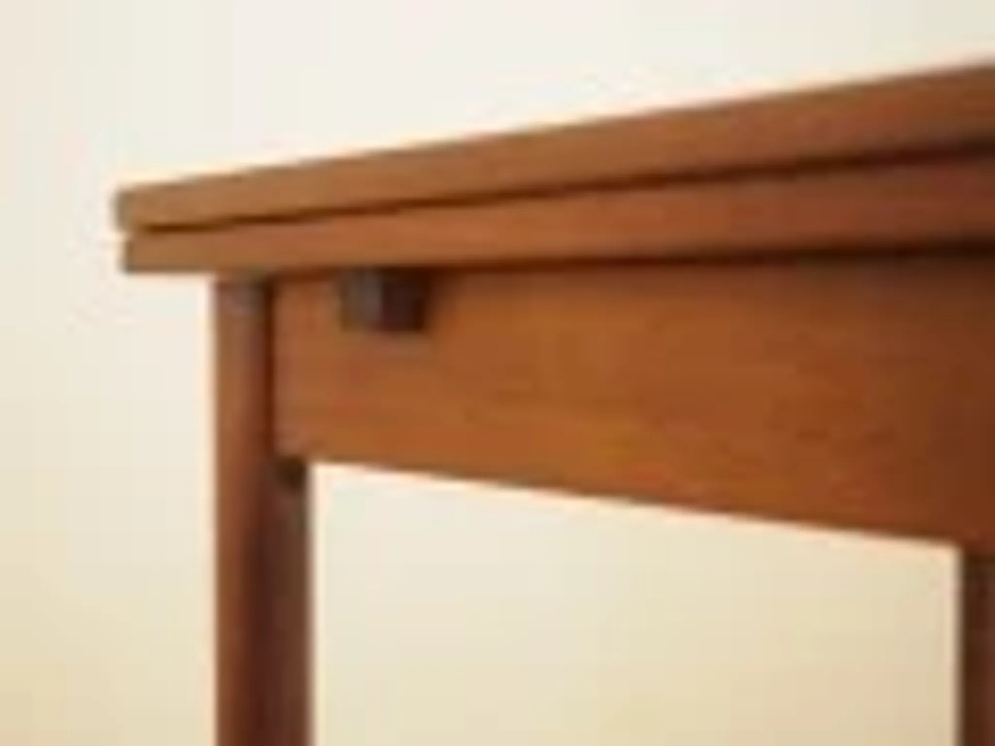 Danish teak extending dining table on solid wood legs, 1970s