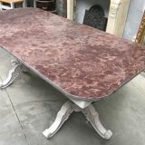 Large middle red speckled marble top table