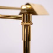 Holtkoetter adjustable Brass swing arm floor lamp. Germany