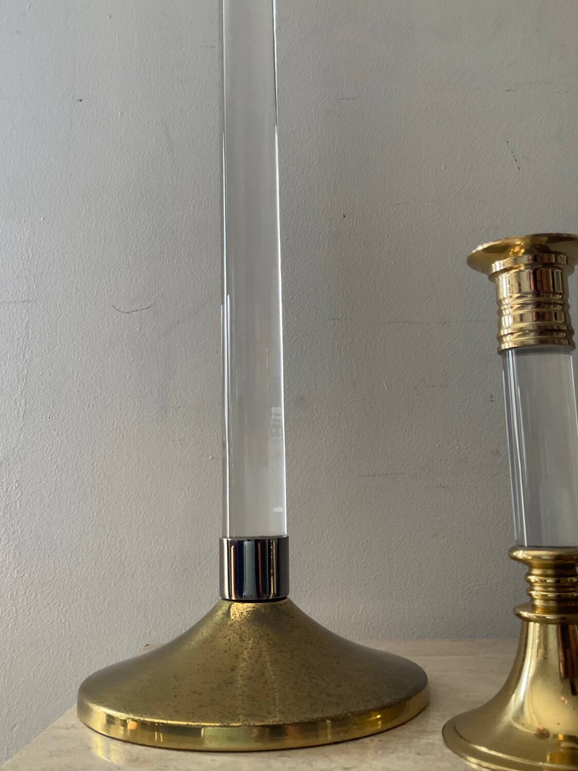 Duo of vintage brass and lucite candlesticks
