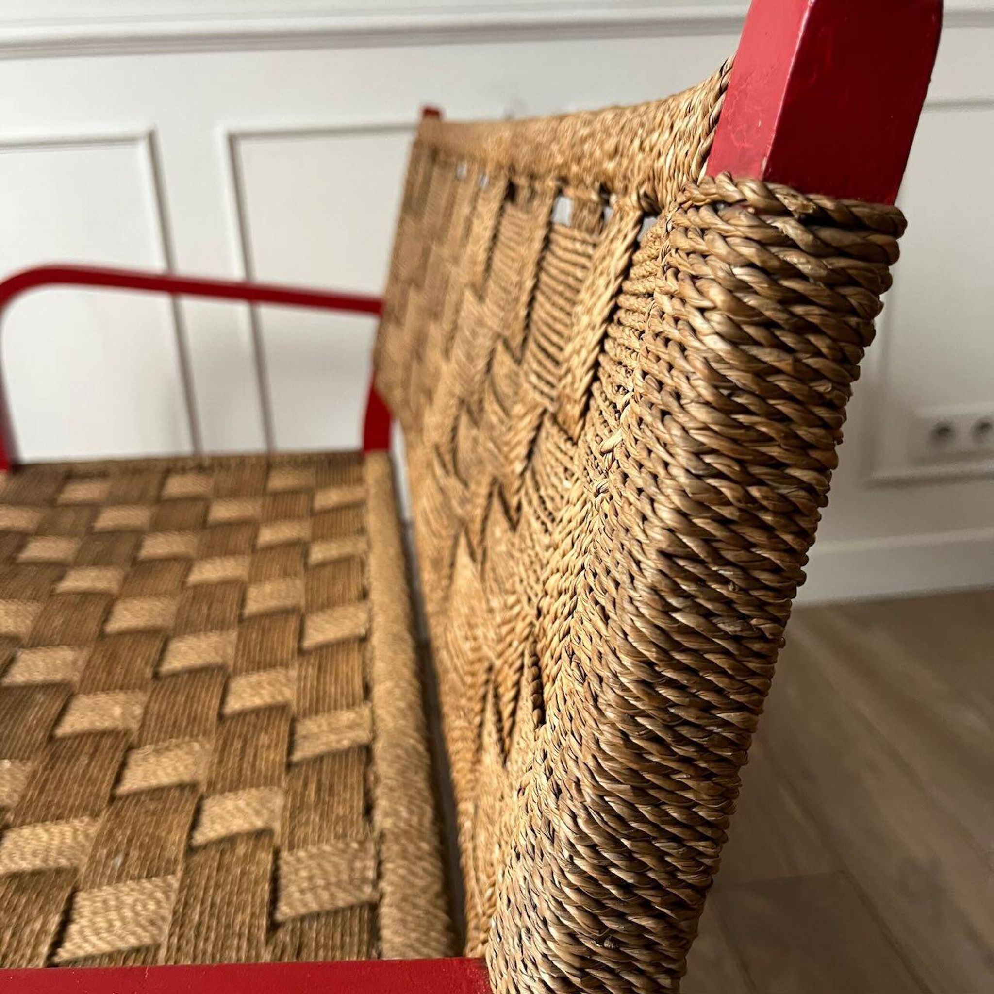 Vintage bench in red wood and rope