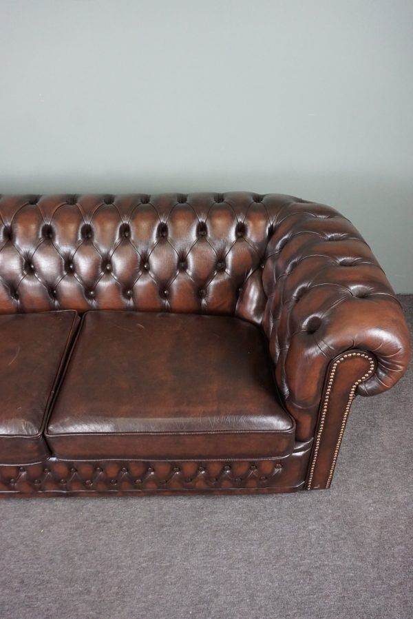 Chesterfield sofa in cowhide, 4 seats