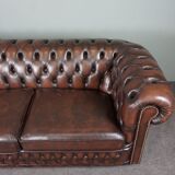 Chesterfield sofa in cowhide, 4 seats