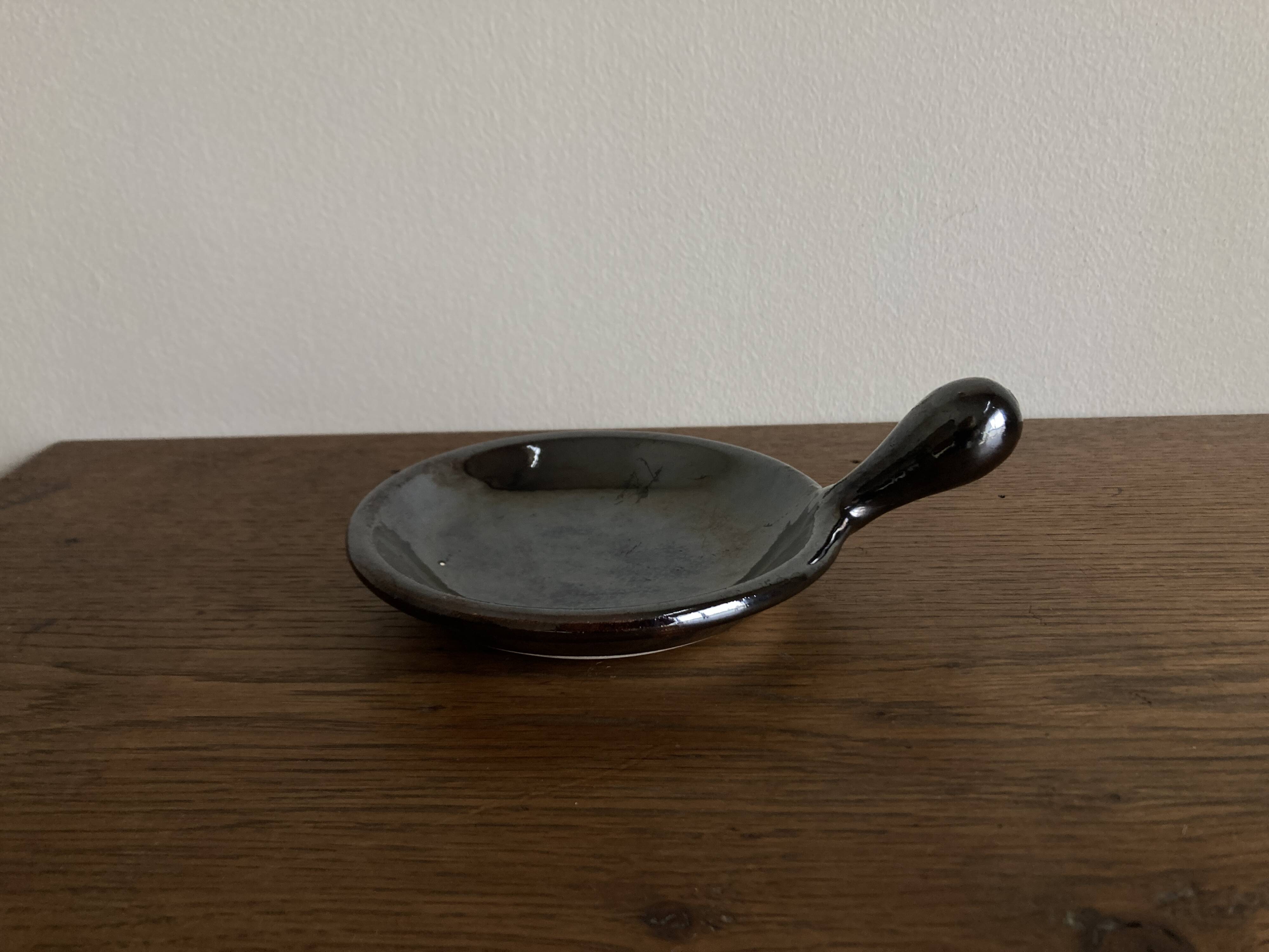 Black glazed earthenware dish 1960