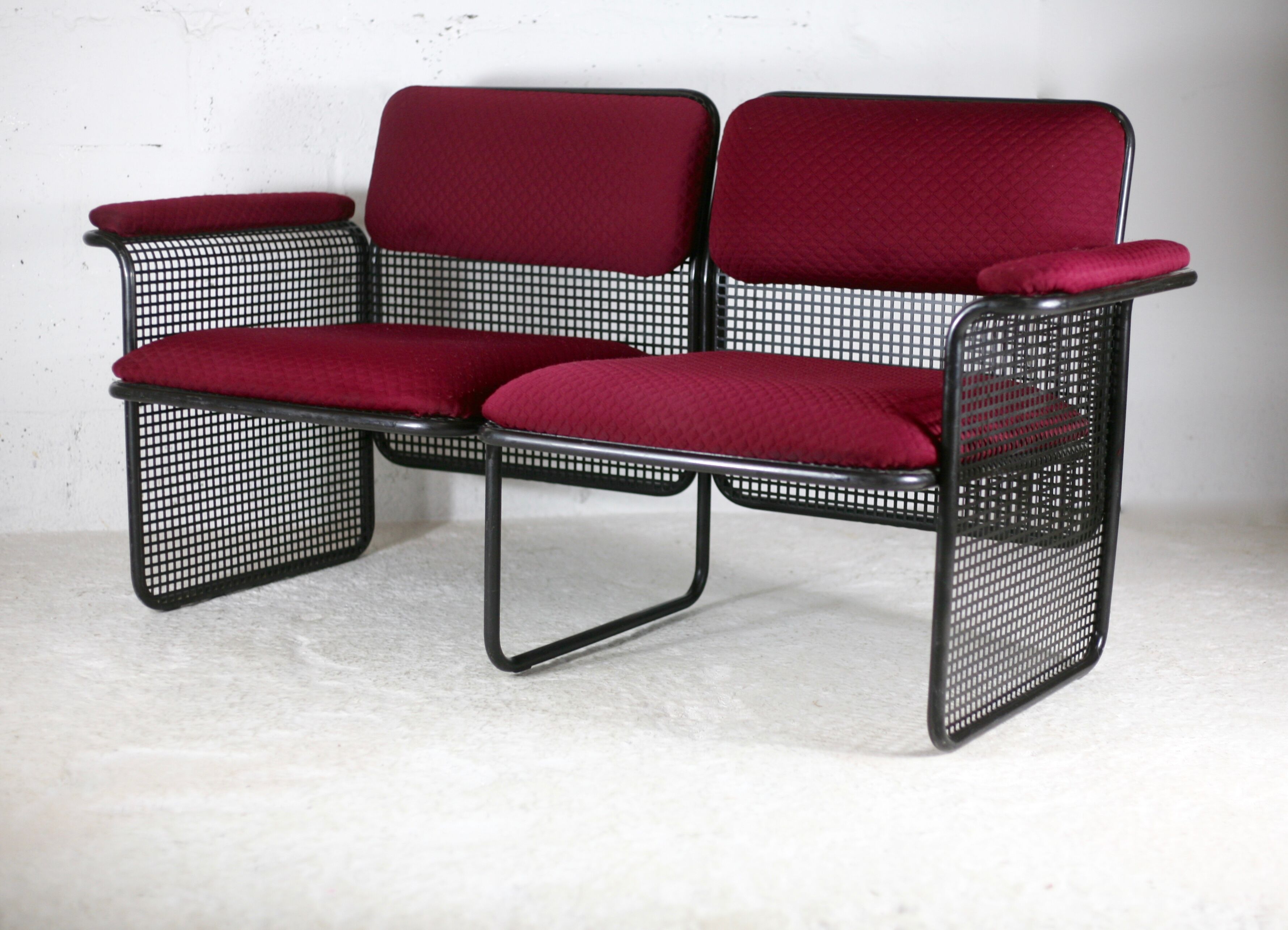 Black honeycomb steel sofa, burgundy fabrics, Italy, circa 1970