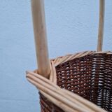Vintage wicker log basket on vintage wheels
