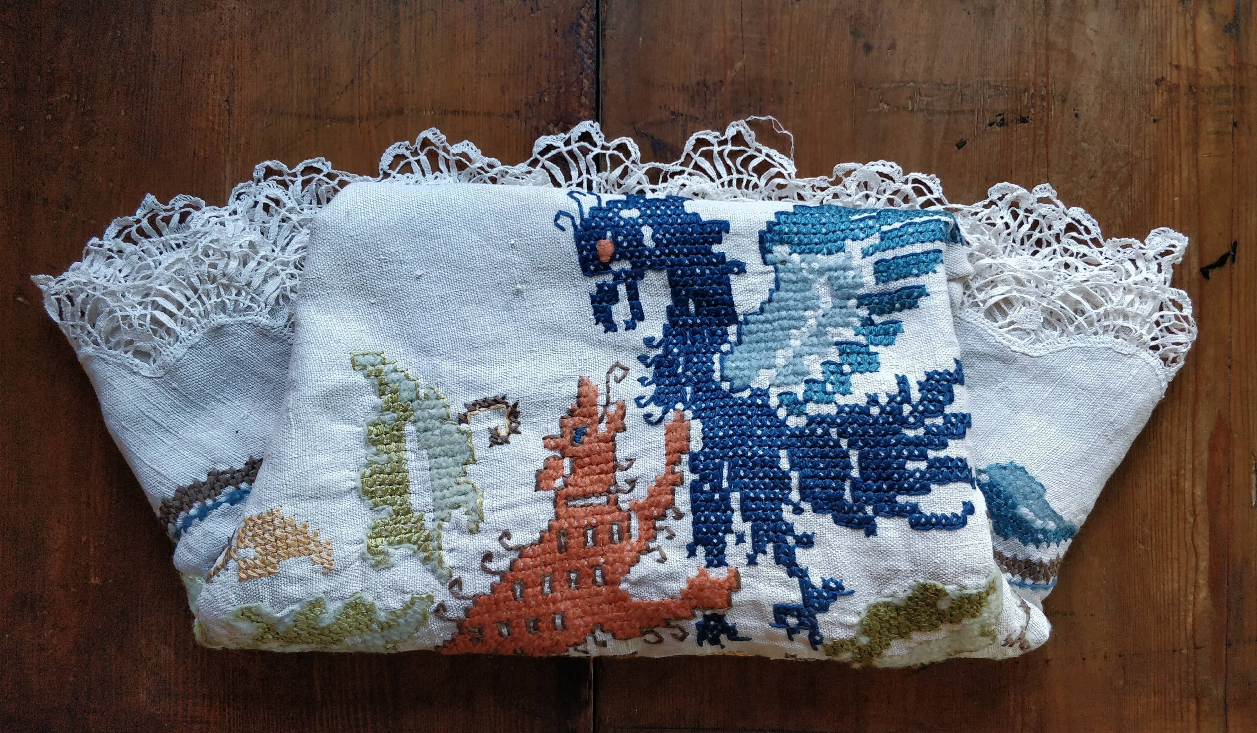 Round embroidered linen tablecloth