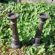 2 bougeoirs en bois sculpté 