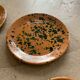 Deep terracotta plates