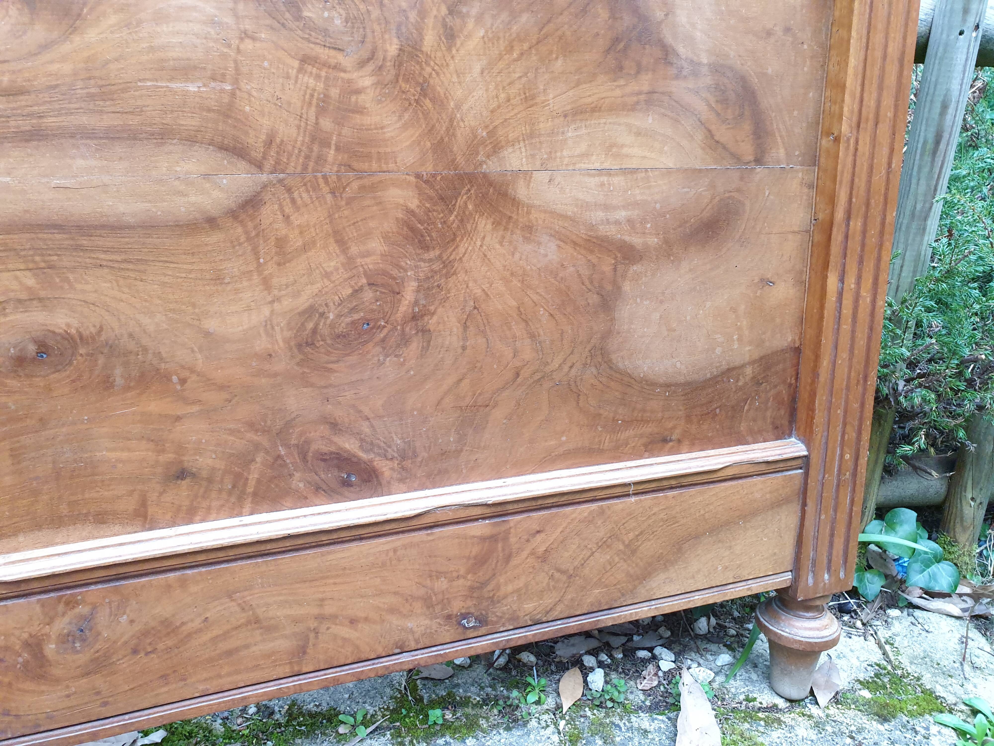Carved walnut headboard