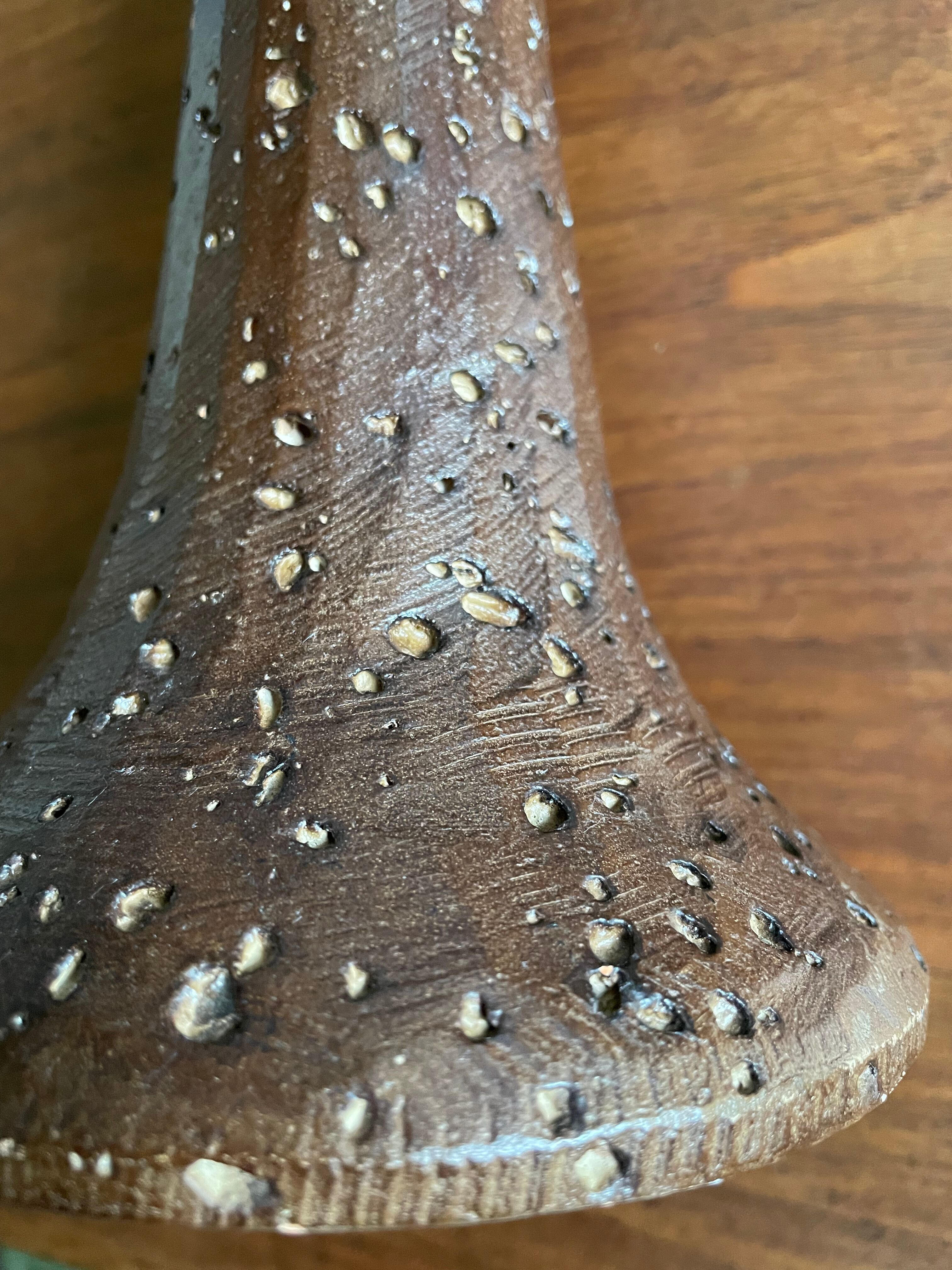 Brown enamelled terracotta candle holder