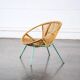 Fauteuil en rotin pieds métal vert