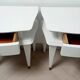 Pair of compass leg bedside tables