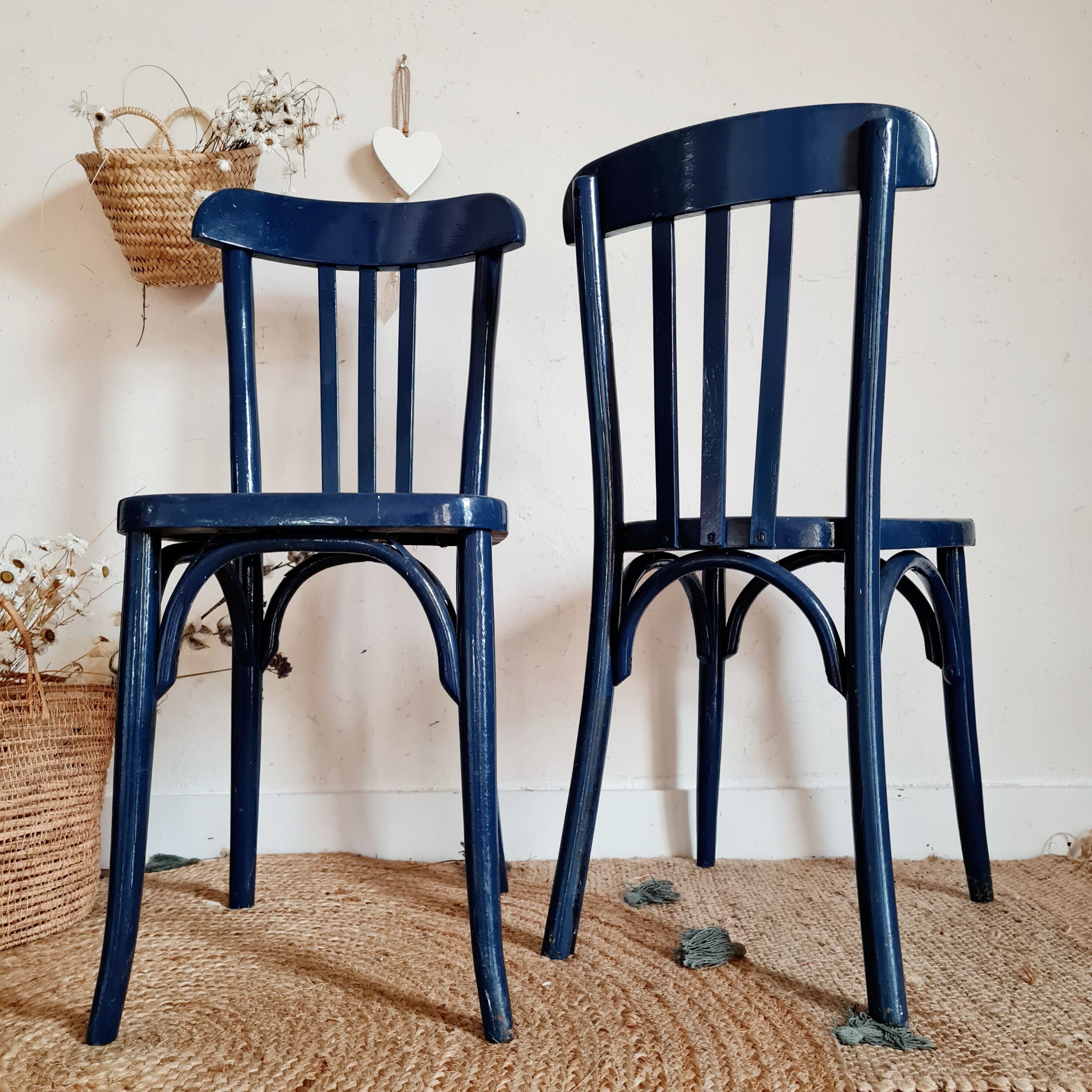 Duo of old blue bistro chairs