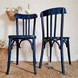 Duo of old blue bistro chairs