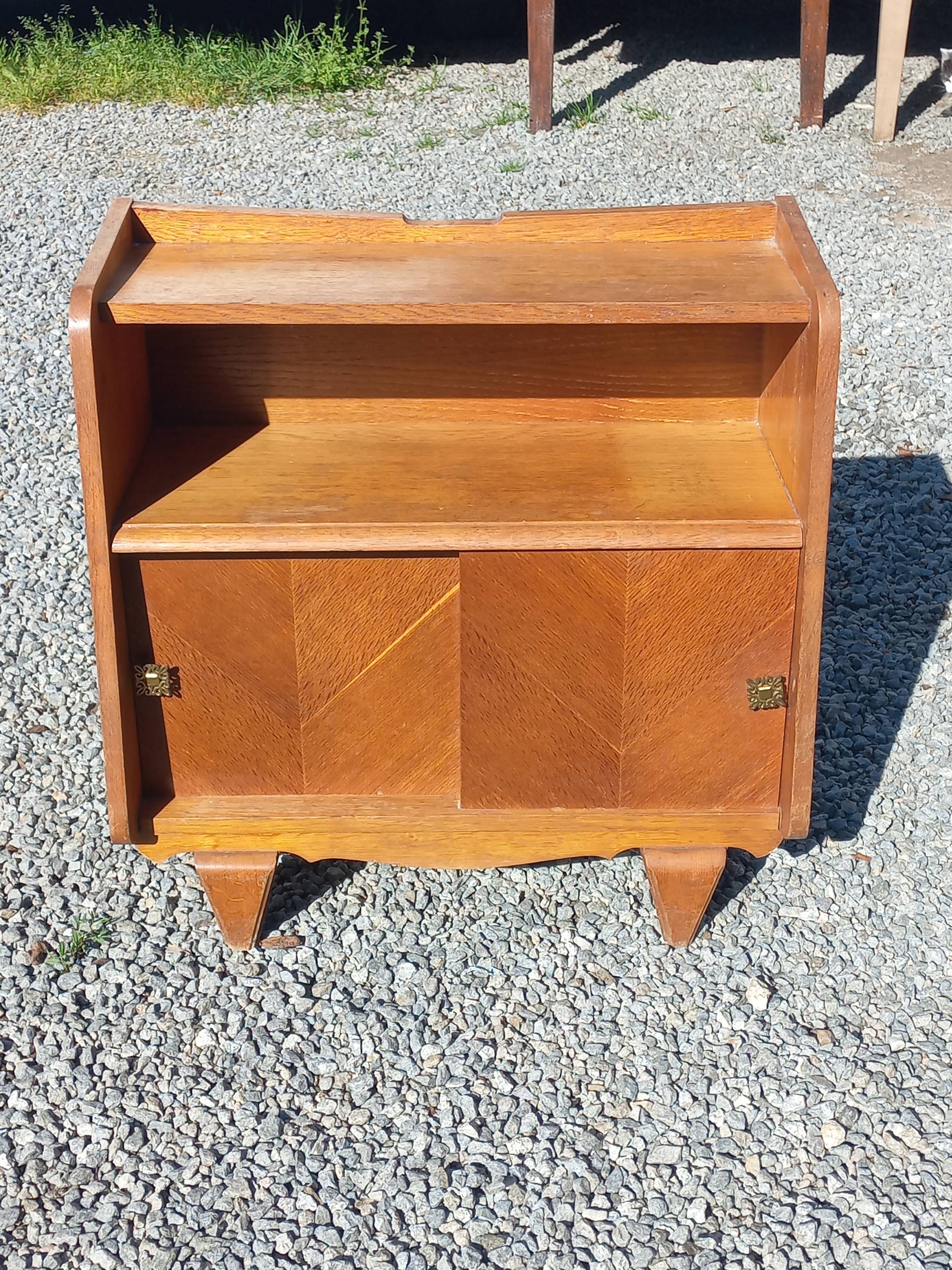 Vintage accent furniture in golden blonde oak with 2 sliding doors.