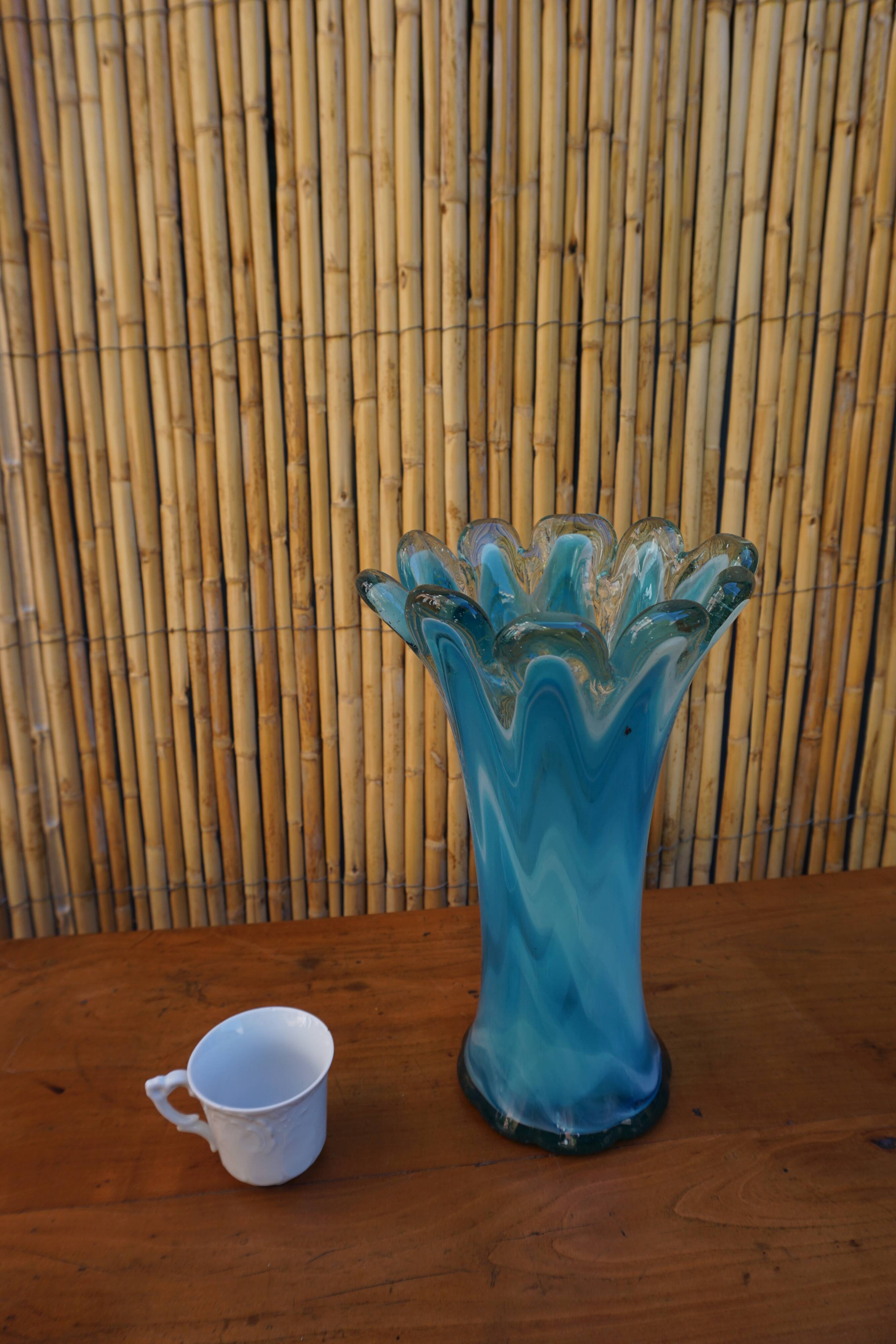Blown glass vase in flower shape