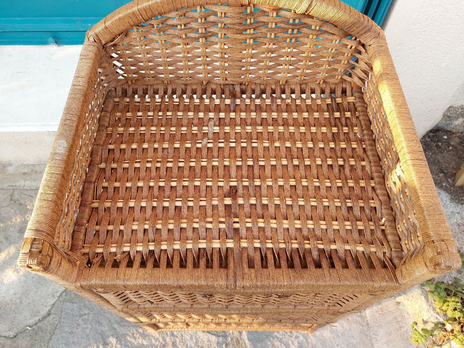 Wicker chest of drawers and rope