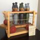 Set of Moulin Roty brand wooden bowling on roller cart, limited series.