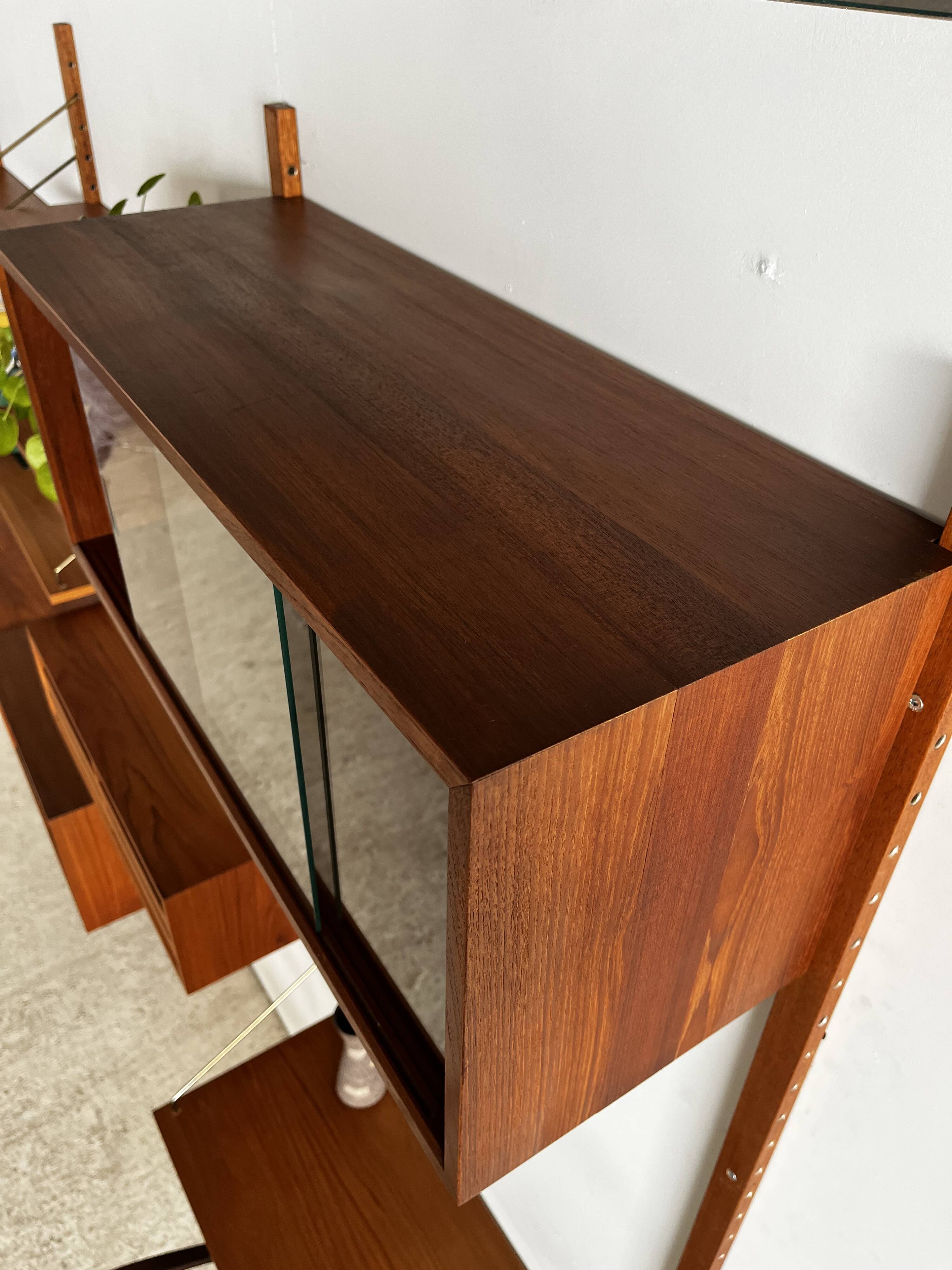 A wall unit with 4 compartments by Poul Cadovius, Denmark, 1960s.