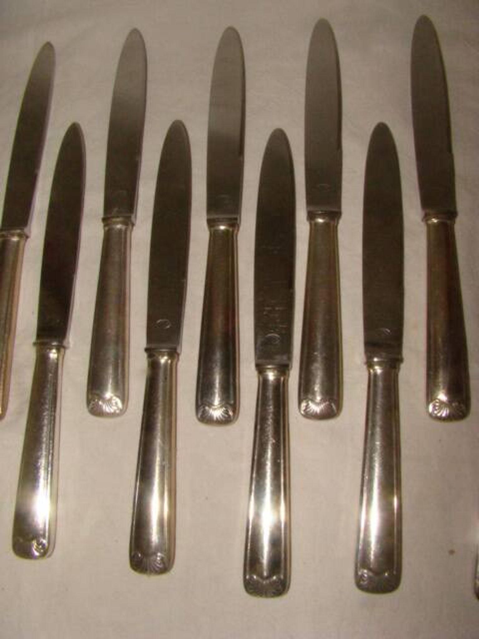 12 stainless steel table knives M.A. from the early 20th century.