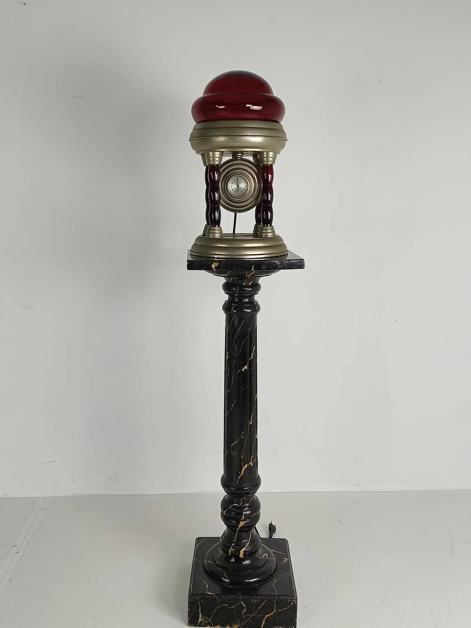 Unique vintage tin lamp with clockwork