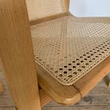 Vintage armchair in caning