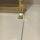 Fireplace screen in smoked glass and brass