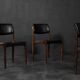 Modern vintage Scandinavian chairs in rosewood and black leather from the mid-century by Bramin, set of 3.