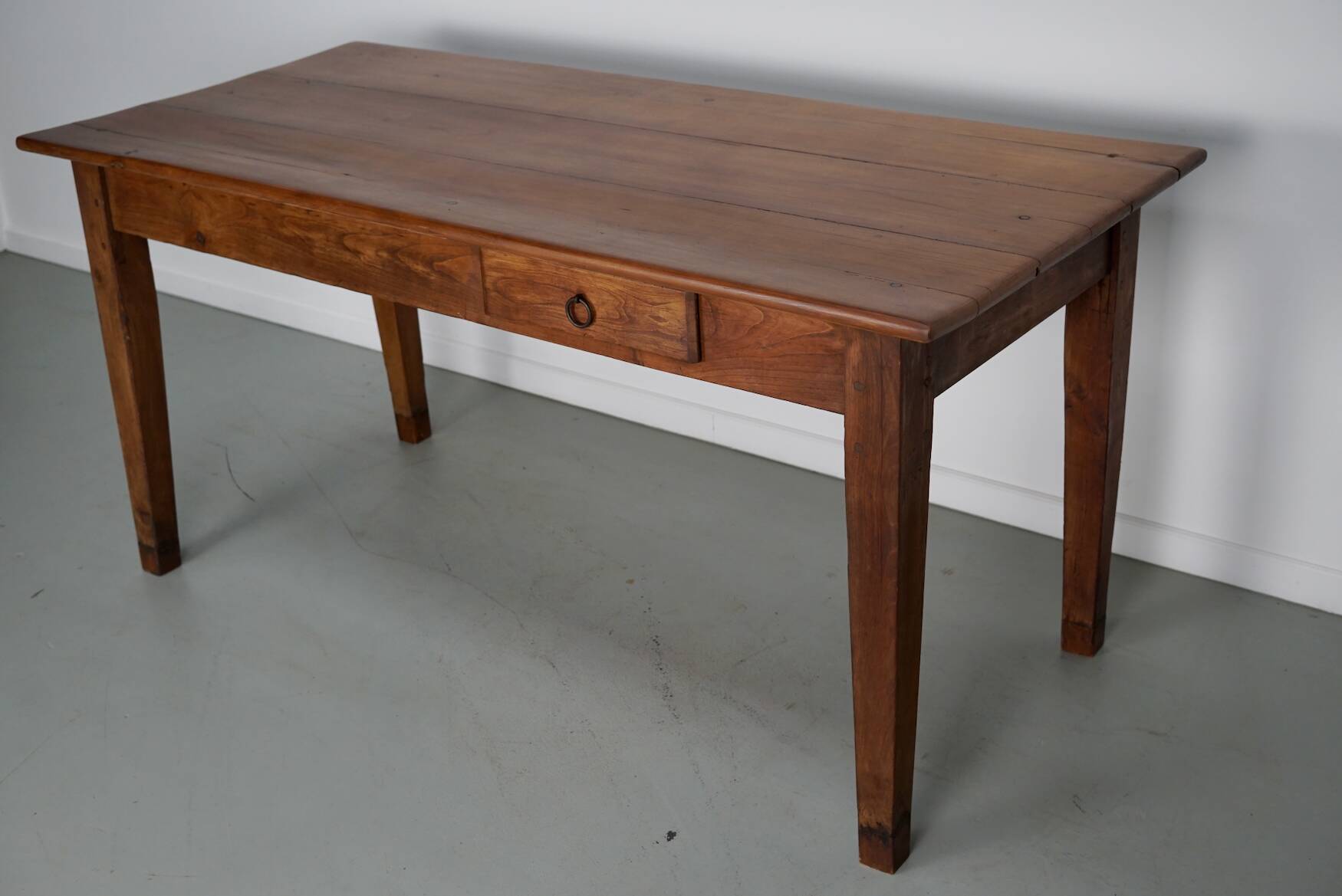 Rustic dining table in fruitwood from the early 20th century